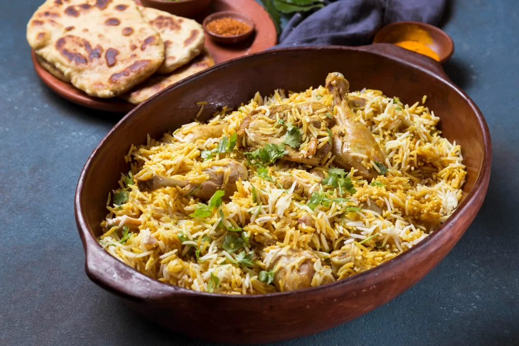 South Indian chicken biryani served in traditional pot for catering events in London